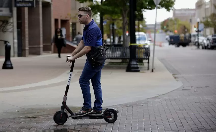 e scooter on sidewalk