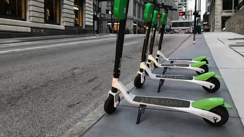 electric scooters on public sidewalk